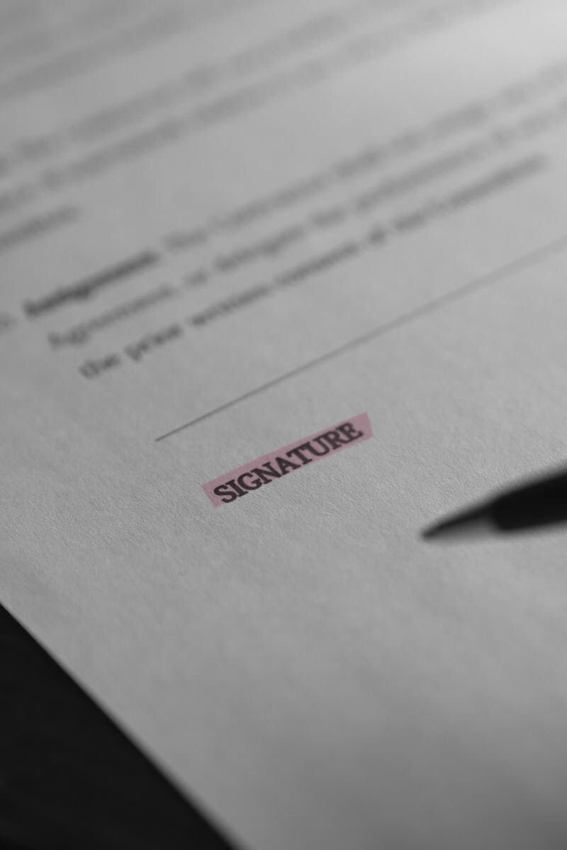 A signature line representing the completion of a property sale